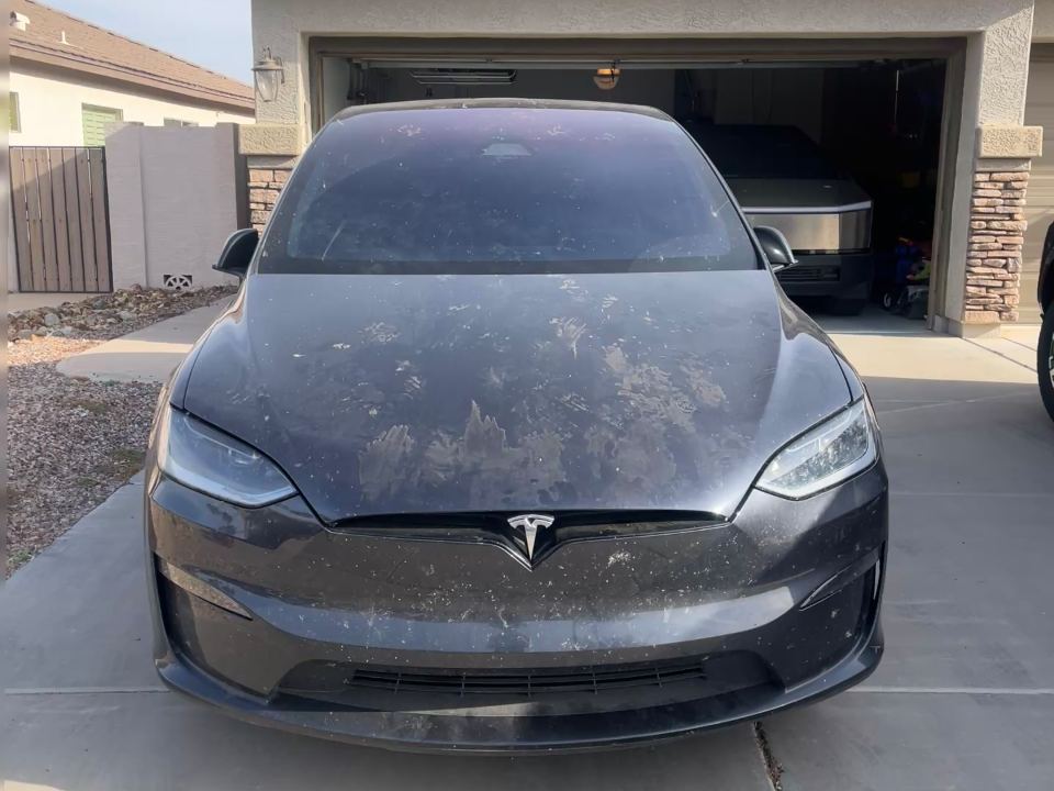 Dusty Tesla Model X covered in Arizona dust before a ZnA mobile detail in Queen Creek